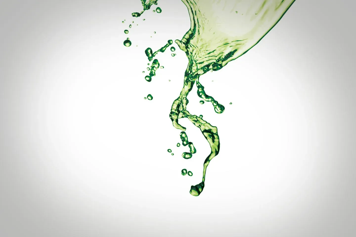 Green liquid splashing into the air